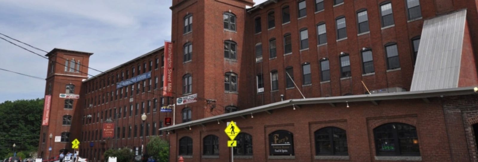 The Washington Street Mills in Dover, a converted brick mill with a restaurant on the ground floor and offices above